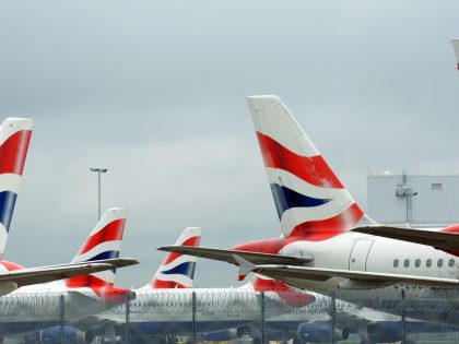 British Airways aircraft sit parked at London Heathrow Airport during