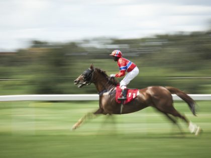 Jockey J.Lokorian riding Kimberly on derby day at Ngong Racecourse.