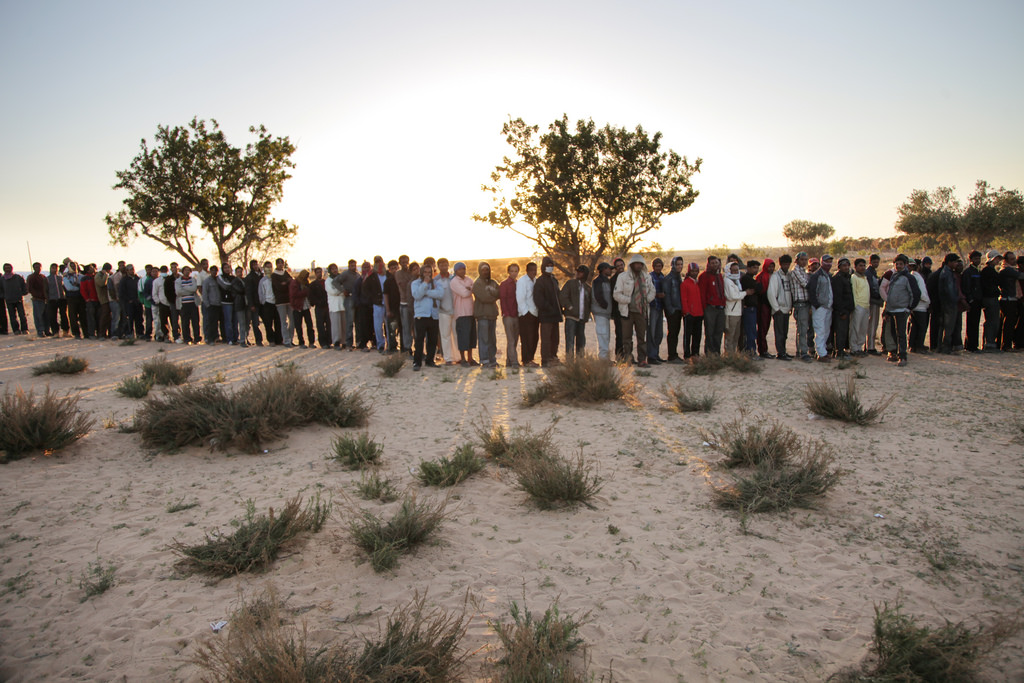Refugees from Libya Queue for Food at Tunisia Transit Camp