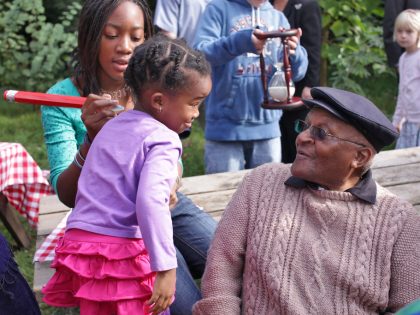 Desmond Tutu with his granddaughters Onalenna and Nyaniso