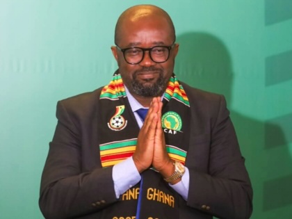 Portrait of Ghana Football Association president Kurt Edwin Simeon-Okraku wearing a CAF scarf during an event announcing his appointment as CAF second vice president.