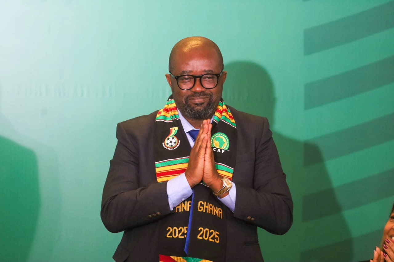 Portrait of Ghana Football Association president Kurt Edwin Simeon-Okraku wearing a CAF scarf during an event announcing his appointment as CAF second vice president.