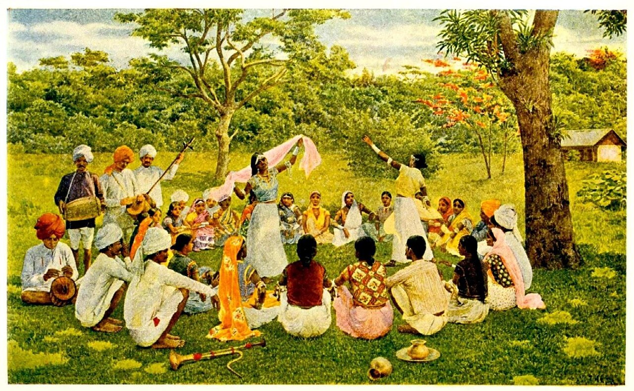 Illustration of East Indian immigrants gathered outdoors on a cacao estate in Trinidad, with musicians, dancers, and seated families beneath trees in a rural landscape.