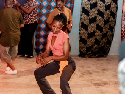 A woman dancing in a nightclub in Tanzania.