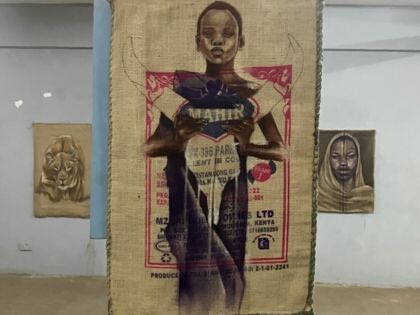 Graffiti on coffee bags in an art gallery.