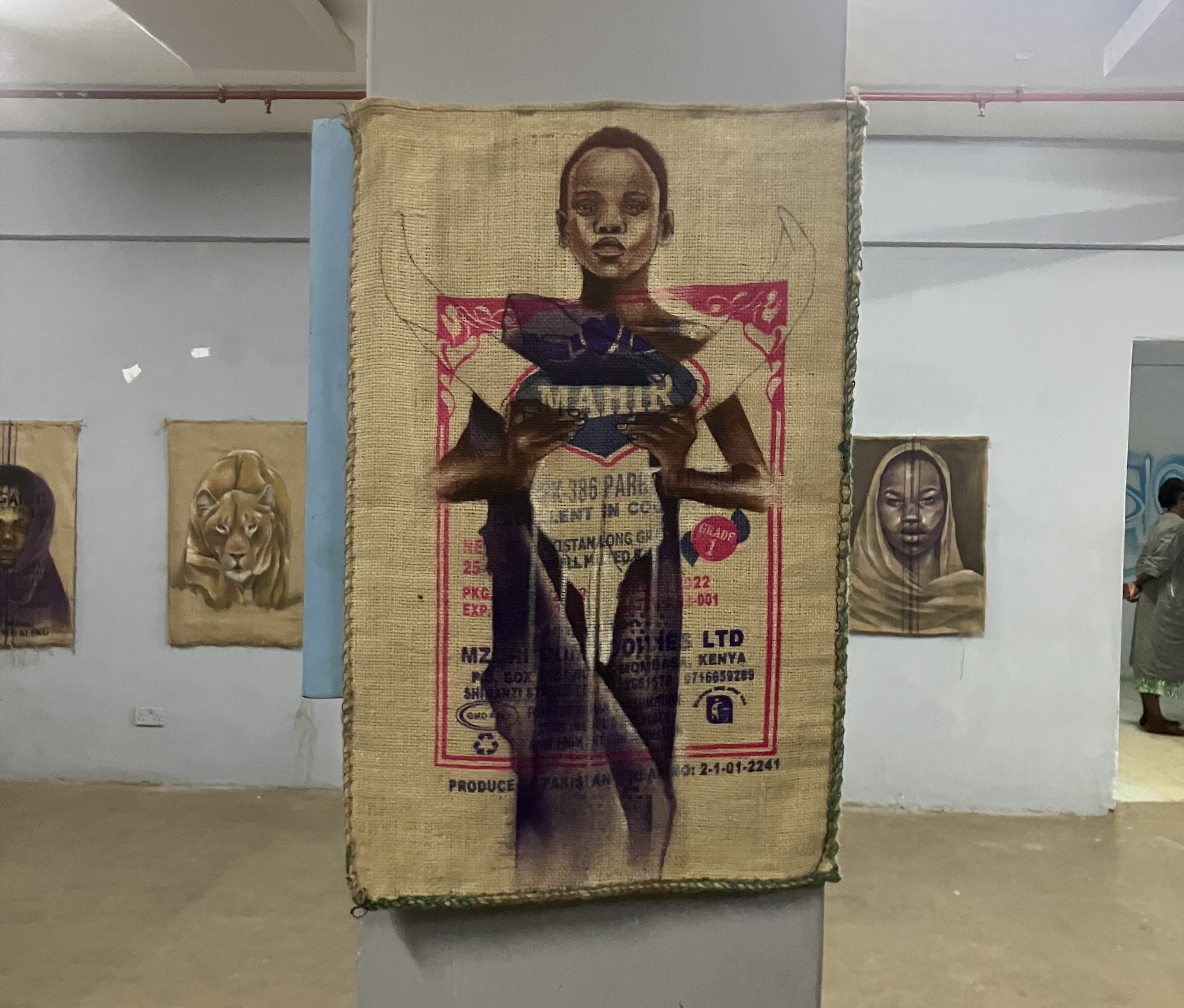 Graffiti on coffee bags in an art gallery.