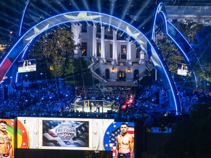 Nighttime view of UFC Freedom 250 on the Ellipse in Washington, D.C., with the White House illuminated in the background as spectators surround an outdoor octagonal cage.