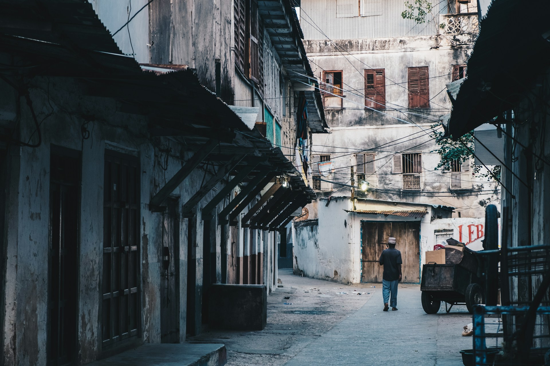 Man walking in the streets of Stone Town, Zanzibar.